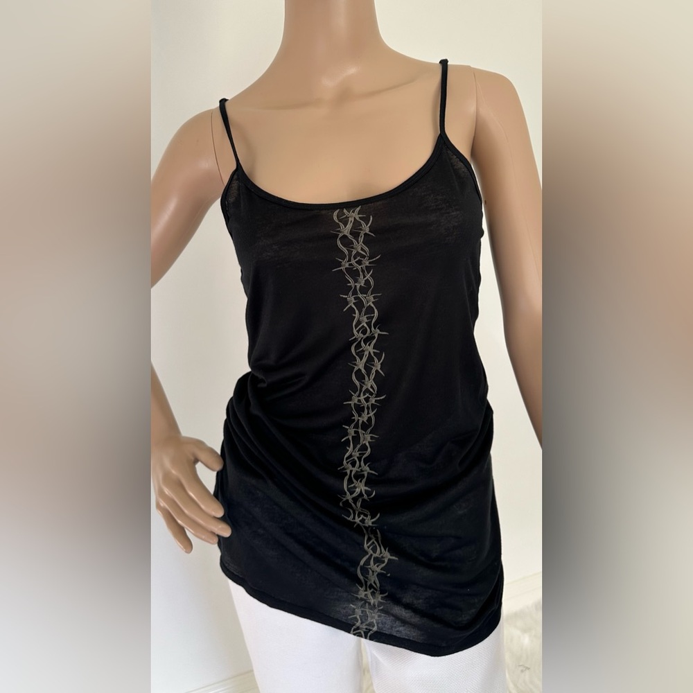 PAULA THOMAS for TW's stylish top.